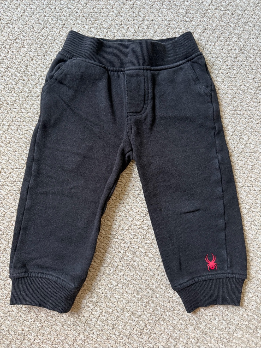 Spyder Kids red insulated puffer vest and black matching sweatpants. - Picture 5 of 6